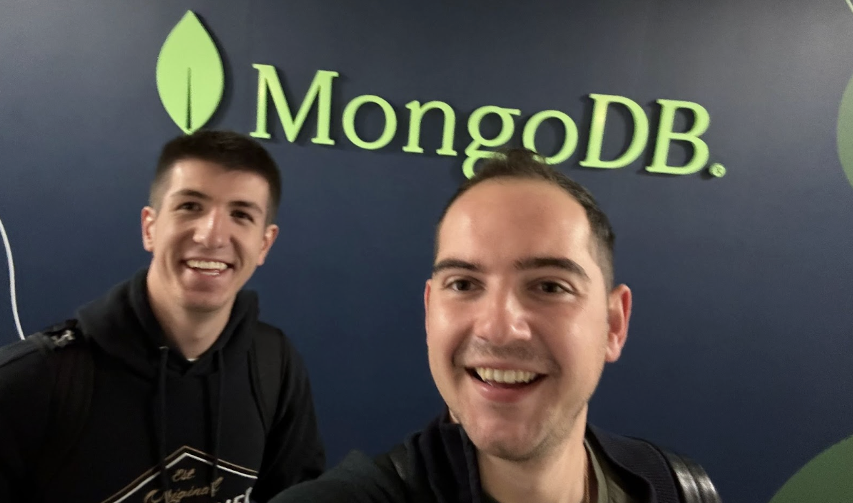 Photo of Yavor Belakov and Iliya Valchanov at a MongoDB hackathon.